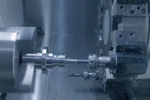 What is CNC turning? Here is the inside of a CNC turning center