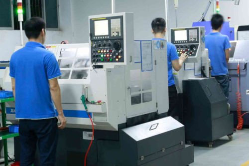 Gensun technicians operating CNC turning centers