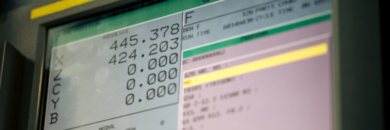 CNC machine monitor display with program code