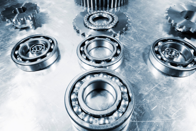 Titanium ball bearings and pinions