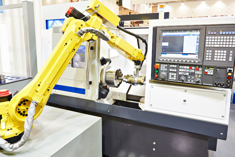 Robotic arm and CNC lathe